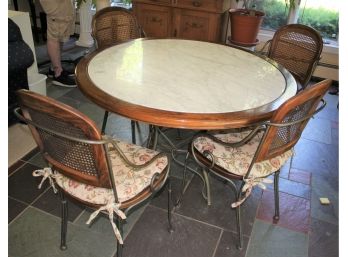 Drexel Heritage Scrolled Wrought Iron Table With A Marble Top Includes 4 Chairs With Cane Style Seating