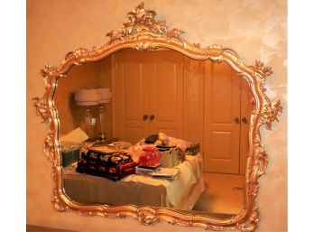 Ornate Wood Mirror With A Carved Flame Crown & A Beautiful Gold Painted Finish
