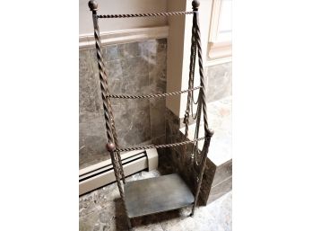 Ornate Metal Towel Rack With A Twisted Design