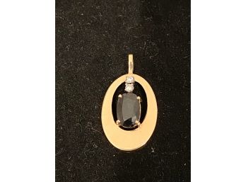 14K YG Pendant With Black Stone Faceted And Two Small Diamonds