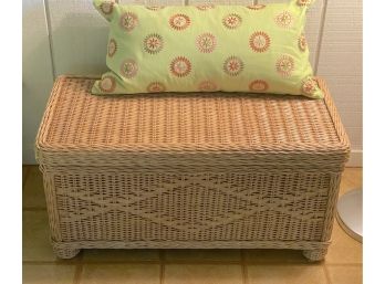 Woven Rattan Storage Chest With Patterned Oblong Pillow