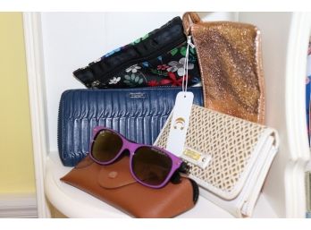 Women's Wallets And Purple Rayban Sunglasses