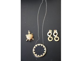Women's Jewelry Lot With Sunburst Pendant Chain And Turtle Pendant