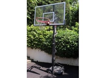 Lifetime Reebok Adjustable Freestanding Basketball Court With Shatterproof Acrylic Backboard