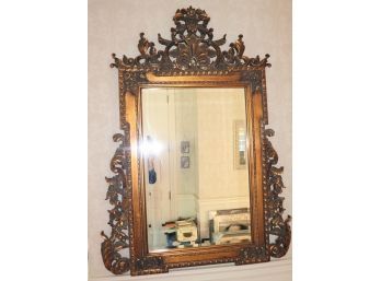 Carved & Antique Gilded Finish Resin Beveled Wall Mirror With Ornate Details