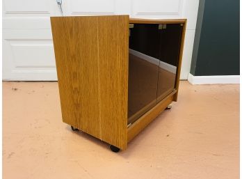 Vintage Oak Rolling Media Cabinet With Smoked Glass Doors