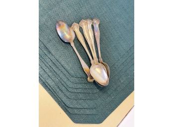 Rogers Bros Spoons With Green Placemats