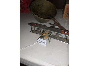 Vintage Metal Plane And Long Handled Copper Colored Pot