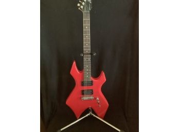 Red B.C. Rich Warlock Guitar With Stand