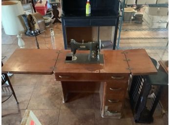 Vintage White Rotary Sewing Machine In Table