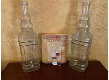 Exploring Wine Book With Two Wine Decanters With Spigots