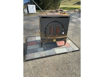 Consolidated Dutch West Solid Fuel Burning Fireplace Stove With Slate Tile Slab