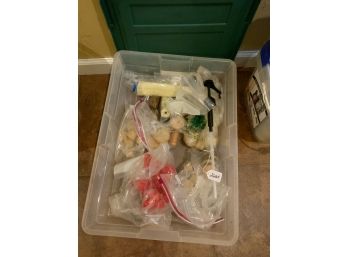 Clear Bin With Miscellaneous Bottling Materials
