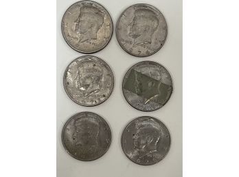 6 Fifty Cent Pieces