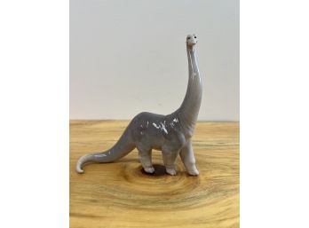 Lladro Stretch Dinosaur