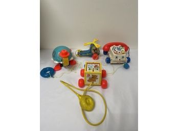 Four Fisher Price Pull Toys