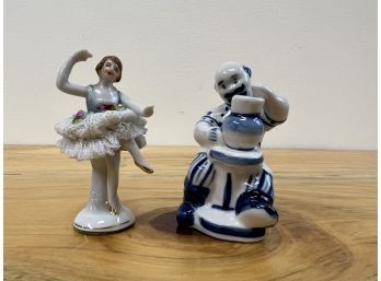 Two Small Figurines