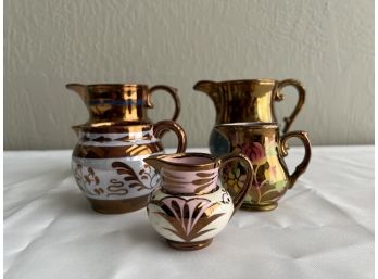 Five Lusterware Pitchers And Creamers