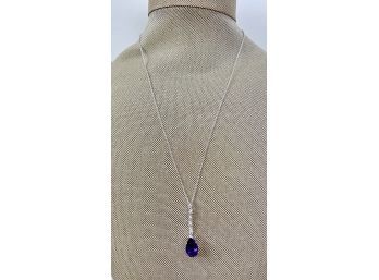 14K Necklace With Diamonds And Purple Stone