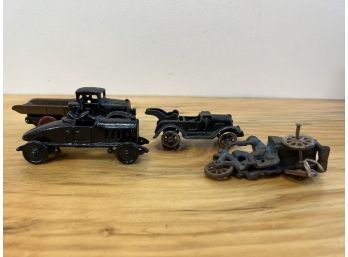 Four Cast Iron Toy Vehicles