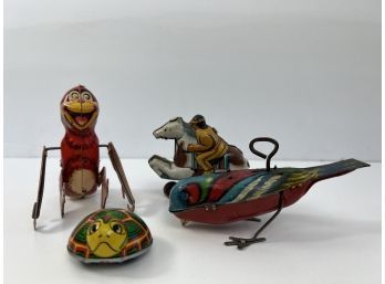 Four Vintage Tin Toys