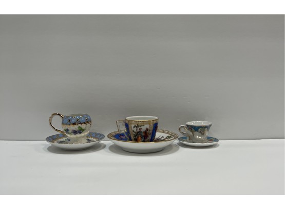 3 Small Cups & Saucers