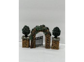 Department 56  Village Collection Stone Corner Posts With Holly Tree And Stone Archway