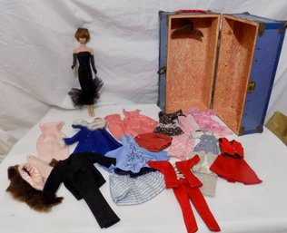 A Vintage Barbie Doll, Clothes, & Trunk