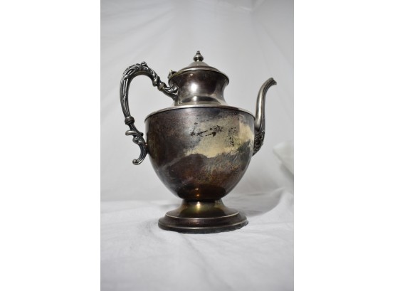 A Silver Plated Teapot With Makers Mark