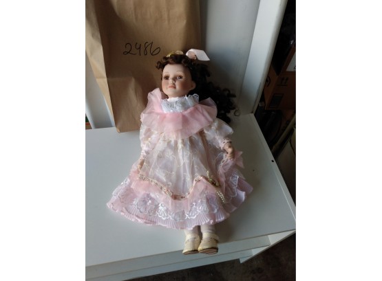 Porcelain Doll In Pink Dress