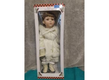 Porcelain Doll In Winter Outfit