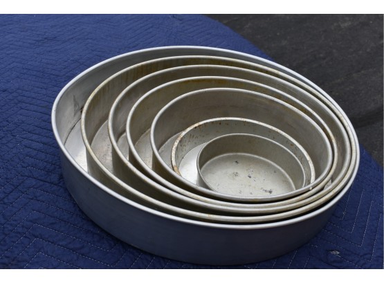 A Complete Set Of Bakers Cake Pans