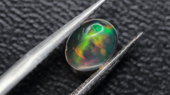 OPAL - NATURAL MEXICAN CONTRALUZ WATER OPAL 0.74CT, 8MM X 6MM X 3MM LOOSE GEMSTONE ESTATE CABACHON OVAL