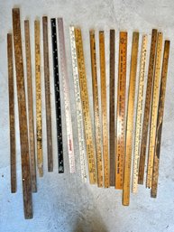 LARGE LOT OF ASSORTED YARD STICKS AND RULERS
