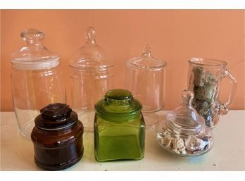 8 Glass Pieces Including 6 Covered Glass Jars