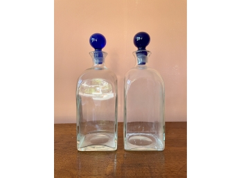 Pair Of Glass Decanters With Blue Stoppers