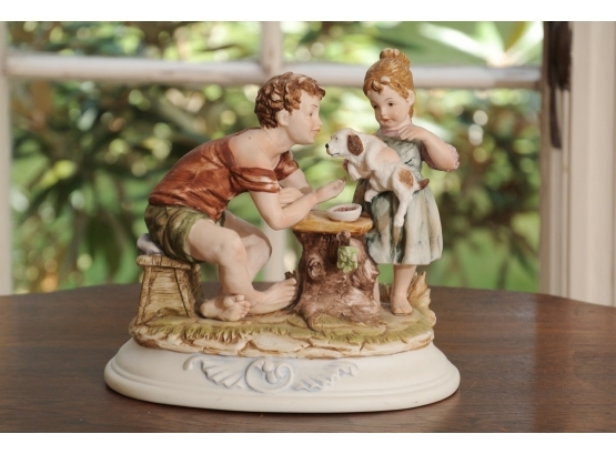 Porcelain Figural Group Of Children With Puppies