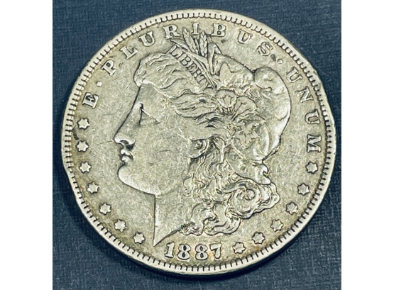 1887 MORGAN SILVER DOLLAR COIN - VF  - RIM DAMAGE
