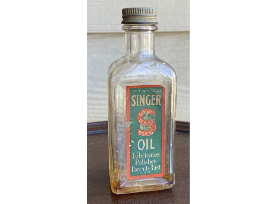 SINGER OIL Bottle 5 Inches Tall