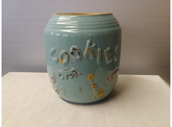 Pottery Cookie Jar With Embossed Circus Animal Surrounding The Body