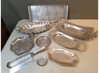 Lot Of 9 Hammered Aluminum & Embossed With Designs In Relief Serving Pieces
