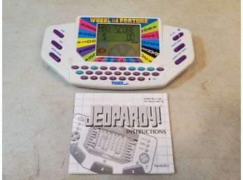 1995 Tiger Electronics Wheel Of Fortune Handheld Game With Cartridge & Instructions, Tested Works