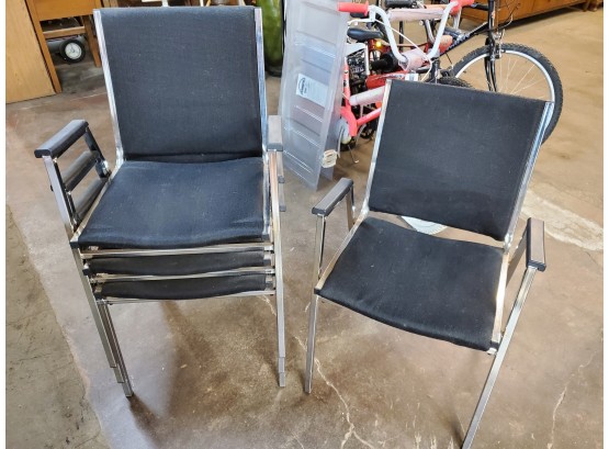Set Of 4 Stacking Arm Chairs, Staples, Black Upholstery, Chrome Frame, 21'w X 22.5'd X 33'h, 18' Seat Height