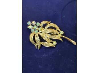 Blue Iridescent Rhinestones & Textured Gold Tone Flower Pin Brooch, 2.25'l