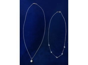 2 Sterling Silver Necklaces, One With A Pearl Type Pendant, The Other With Clear Crystals, 3.5g Total