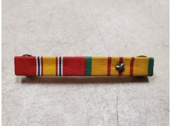 Military Ribbon Bar: (L) National Defense Service Medal (R) Vietnam Service Medal, Multi Campaign Service Star