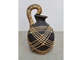 16' Ratan Wrapped Brown Pottery Jug With Curved Handle, 10' Diameter, Unmarked, Good Condition