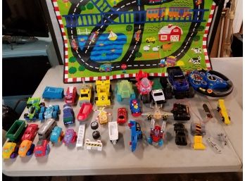Lot Of Plastic Cars & Trucks, Mat & NASCAR Steering Wheel Game