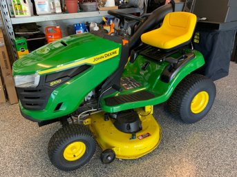 John Deere S100 Lawn Tractor Plus 2 Bag Material Collection System.