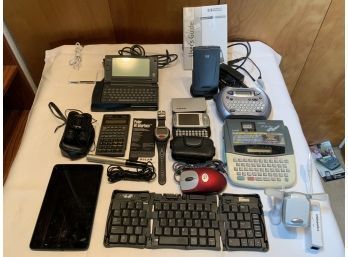 Various Data Electronics. HP Pocket PC, Labelers, Philips Velo 1, Polar, Stowaway